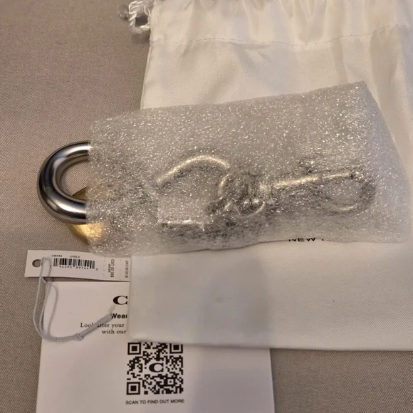 Coach | The Summer I Turned Pretty | Infinity Silver and Gold Keychain Bag Charm - Picture 12 of 16